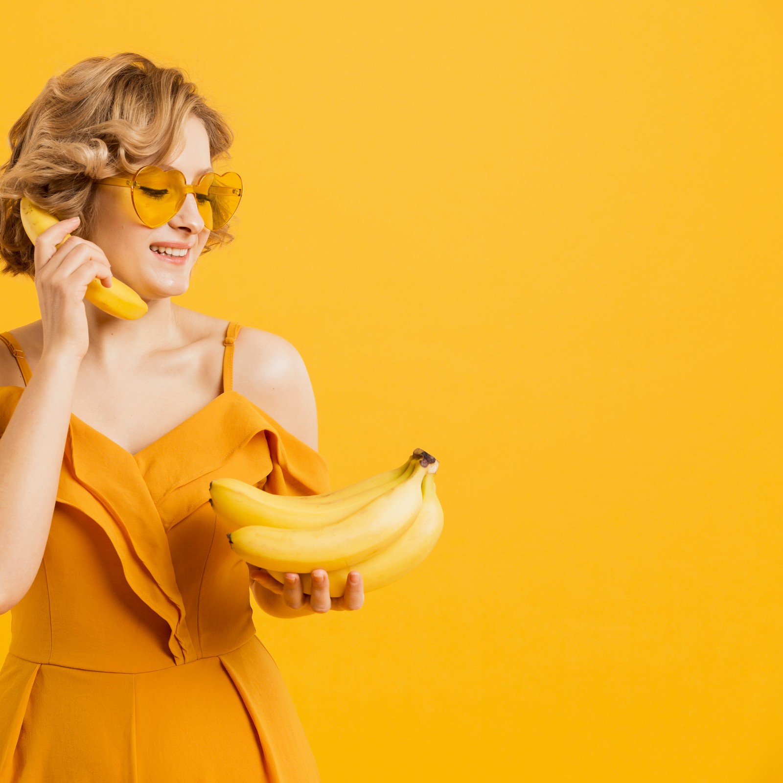Woman calling with banana